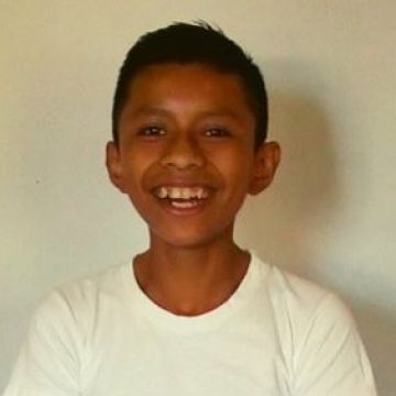 Denis is a happy 14-year-old who loves to make others laugh. He dreams of becoming a nurse one day.